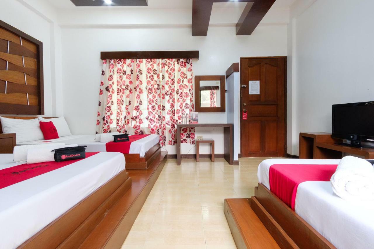 Reddoorz Premium @ Abueg Road Extension Puerto Princesa Buitenkant foto